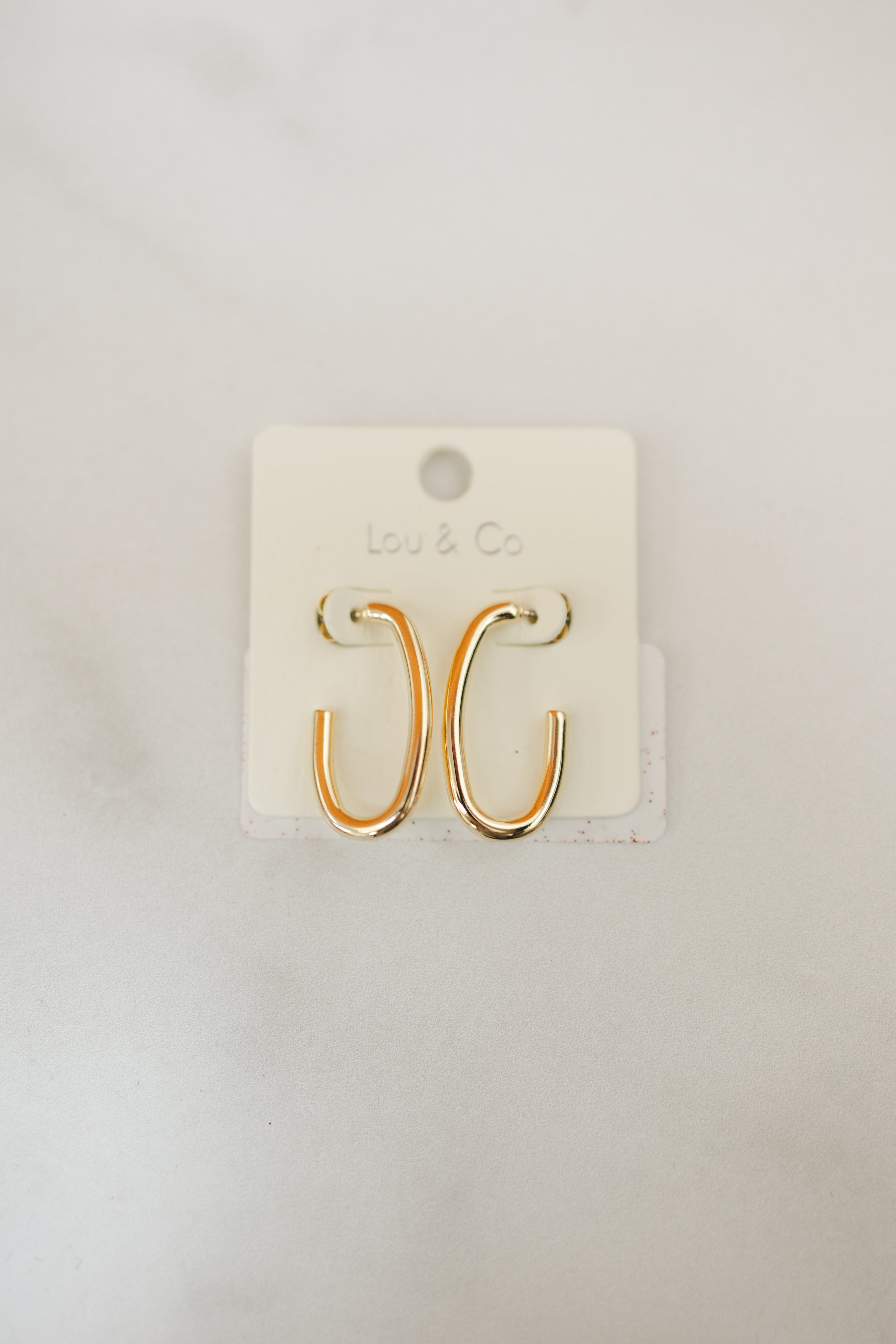 Gold-Dipped Oval Hoop Earrings